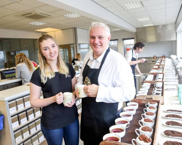 Lucy Swainston, an Employment Recruitment Officer with Learning Curve Group, is pictured with Nick Hancock, Ringtons Employee Development and Welfare Manager, at the companys tea tasting department.
