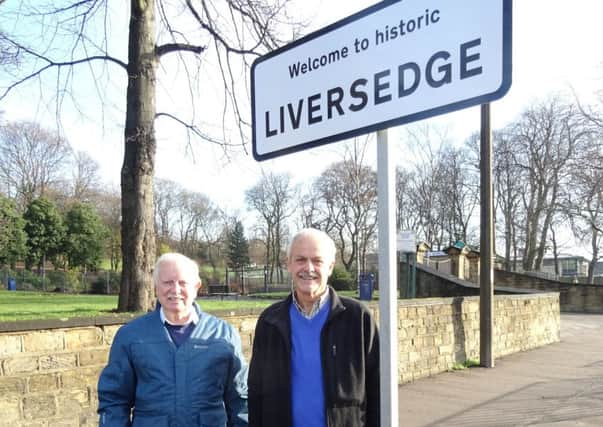 Boundary: David Durrans (left) and Max Rathmell at the A638 sign.