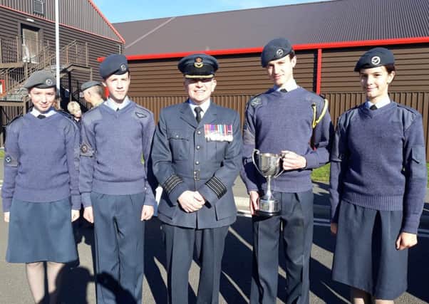 Winners: Cadet Freya Pugh, cadet Daniel Bartey, Group Captain Mark Leeming, Corporal Christian Bartey and cadet Laila Robinson.