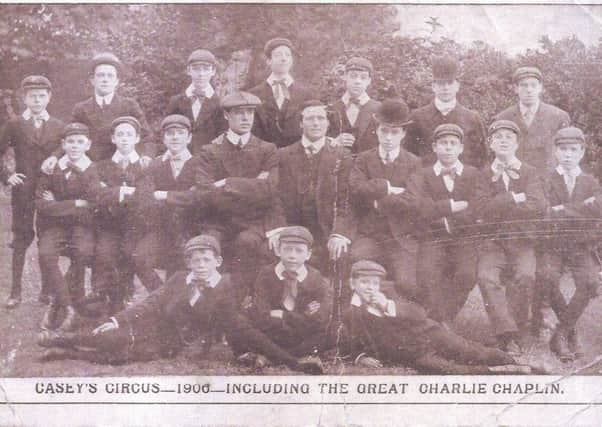 True greats: The young Charlie Chaplin is pictured seated in bowler hat on the middle row when he appeared at the Empire Theatre in 1906 with Caseys Circus. Also pictured, second on the left, on the same row, is a young Stan Laurel, who had strong family connections with Dewsbury. Many of his relatives lived here.