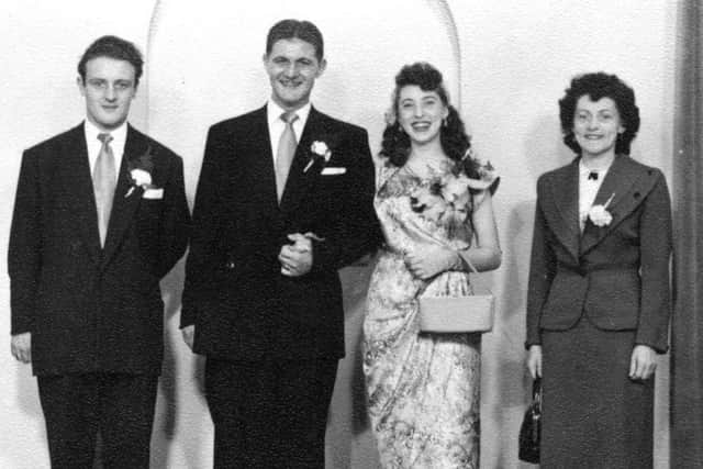 The happy couple: Winnie Taylor and Harvey Kettle on their wedding day with their bridesmaid and best man.