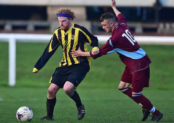 Lewis Collinson (right) curled home a terrific free-kick as Norristhorpe earned a 4-2 victory over Huddersfield Amateur in Yorkshire Amateur League Division Three. Picture: Paul Butterfield