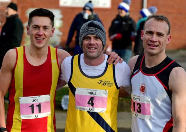 Runner-up Joe Sagar (Spenborough AC) with race winner Chris Parr (Jarrow & HebburnAC) and third placed Scott Hinchcliffe (Penistone Footpath Runners).