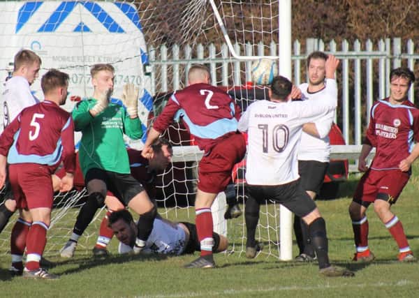 Action from last Saturdays thrilling West Riding County Amateur League Premier Division game between Littletown and Ryburn United at Beck Lane, in which the home side took the spoils with a 7-4 victory. Pictures: Chloe Feather