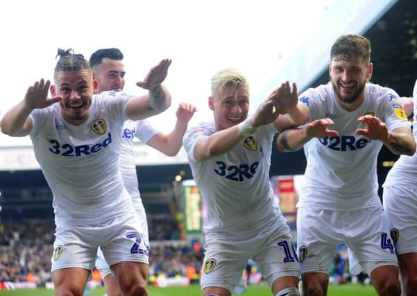 Leeds United players celebrate Ezgjan Alioski's winning goal against Bolton.