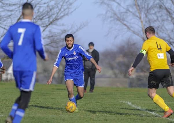 Action from the recent Yorkshire Amateur League clash between Division Five promotion chasers Savile United and Batelians. Pictures: Scott Merrylees