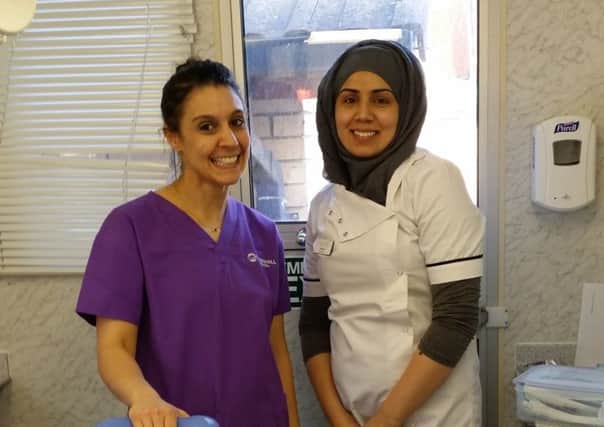 Teeth team: Volunteers on Dentaids mobile dental unit in Dewsbury.