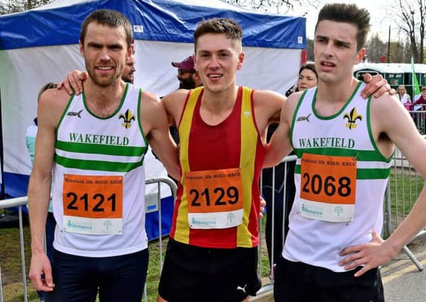 Spen AC's Joe Sagar after winning the Wakefield 10K last Sunday, with runner up Ben Butler and Mark Bostock, who finished third.