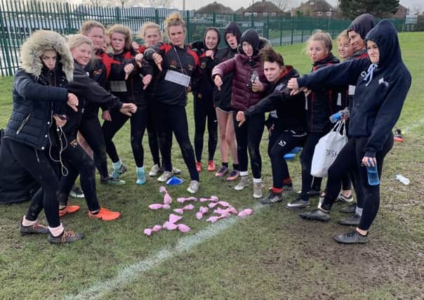 Shaw Cross Sharks under 16 girls rugby team in Dewsbury regularly have to clear their pitch of dog mess before training sessions
