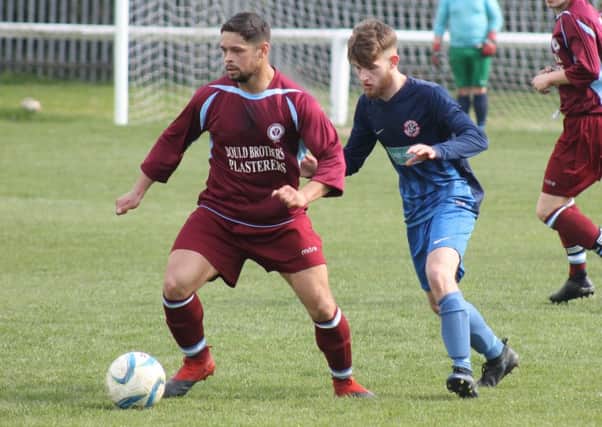 ittletown in West Riding County Amateur Premier Division action against Ovenden last Saturday, when they kept alive their title hopes with a 2-1 win. Picture: Chloe Feather