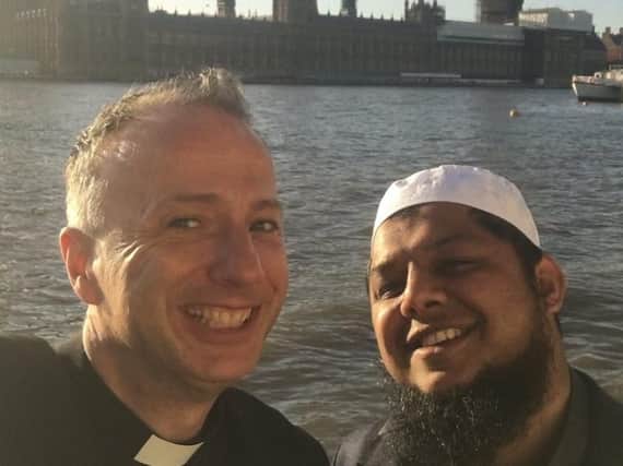 Friends Mark Umpleby and Irfan Soni share a smile on a recent trip to London.