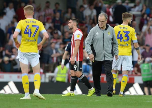 Marcelo Bielsa and dejected Leeds United players at full-time. Picture: Bruce Rollinson
