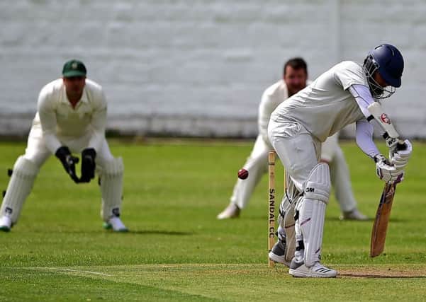 Heckmondwike and Carlinghow batsman Adnaan Rawat in action against Sandal last Saturday.