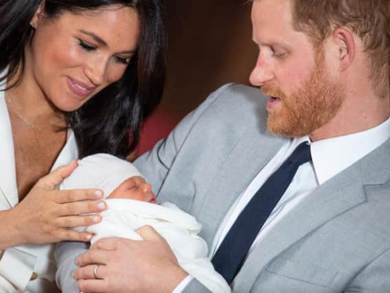 The Duke and Duchess of Sussex with their baby son Archie Harrison Mountbatten-Windsor