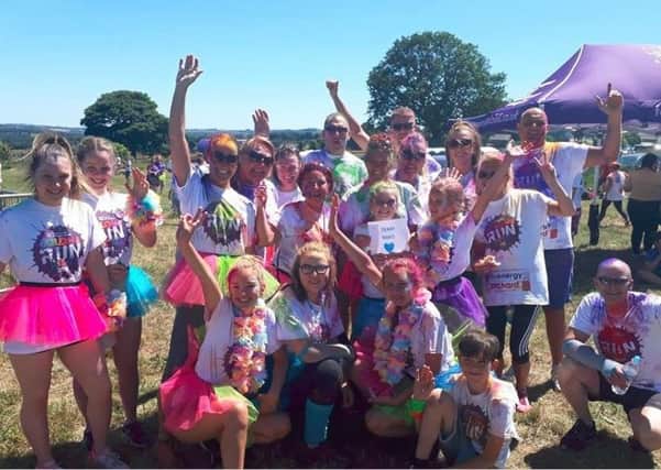 Top Team: Susan Mountain with family and friends at Forget Me Nots Colour Run last year.