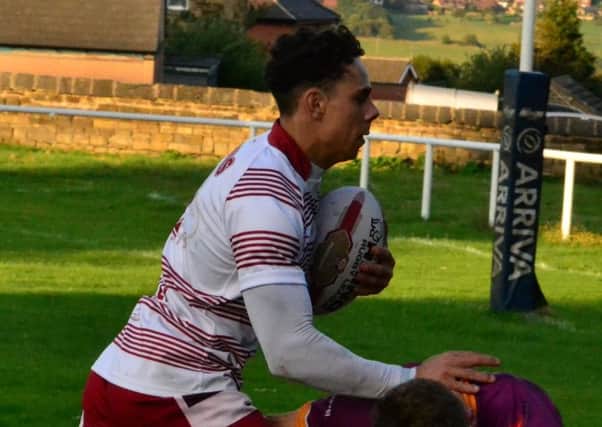 Joel Gibson scored a hat-trick of tries and kicked eight goals as Thornhill Trojans recorded an emphatic win over Rochdale Mayfield to boost their hopes of survival in the National Conference Premier Division.