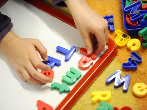 The number of children using Sure Start centres in Kirklees has plummeted.