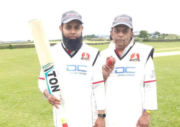 Mount Sunday team player Ibrahim Sidat (left) who hit 49 and Bashir Sidat  who took 7 for 23 against Queensbury