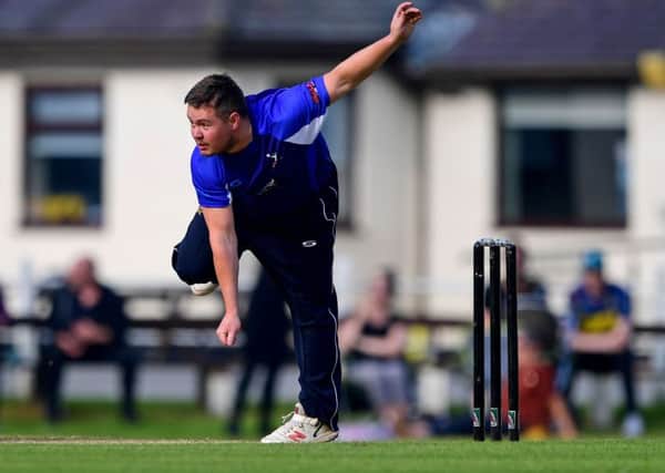 James Byrne claimed 3-31 as Hanging Heaton defeated Yorkshire Vikings. Pics: Paul Butterfield