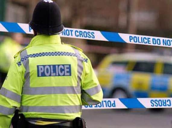 Armed police and string of arrests in Dewsbury after house damaged and car set on fire