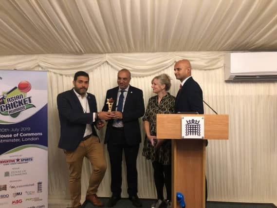 Abdul Ravat from Mount Cricket Club  receiving the award from Arbinder Chatwal, Head of India Advisory Services at BDO, accompanied by Tracy Brabin MP and Dharmesh Sheet of Sky Sports News.