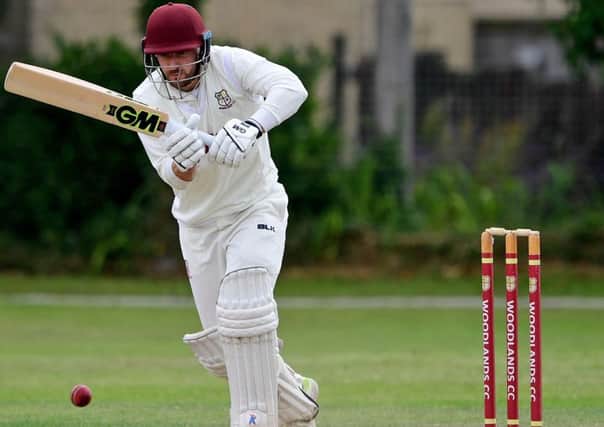 Greg Finn in action forWoodlands during Sundays comfortable Priestley Cup semi-final victory over Hanging Heaton at Albert Terrace as the Bradford Premier League leaders maintained their double hopes. Picture: Paul Butterfield