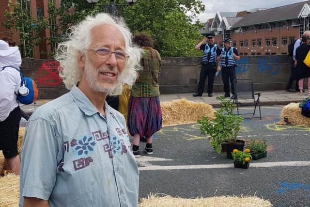 Protester Anthony Whitehouse, 67, is willing to risk arrest.