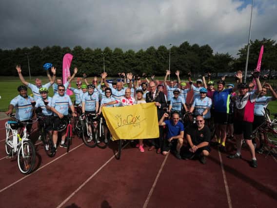 The Jo Cox Way Bike ride, Princess Mary Stadium, Cleckheaton. Jo Cox's sister Kim Leadbeater is pictured with cycling legend Brian Robinson, 89, with the cyclists. 
Picture by Simon Hulme