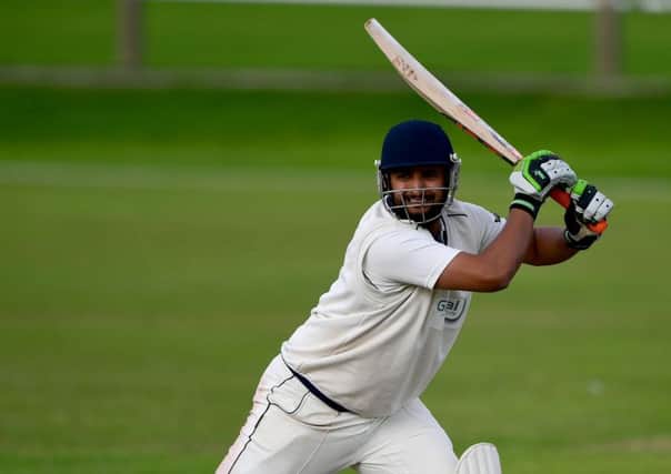 Kashif Talib scored 115 and followed up by taking 4-13 as Batley beat Pudsey Congs to reach the Priestley Shield semi-final.