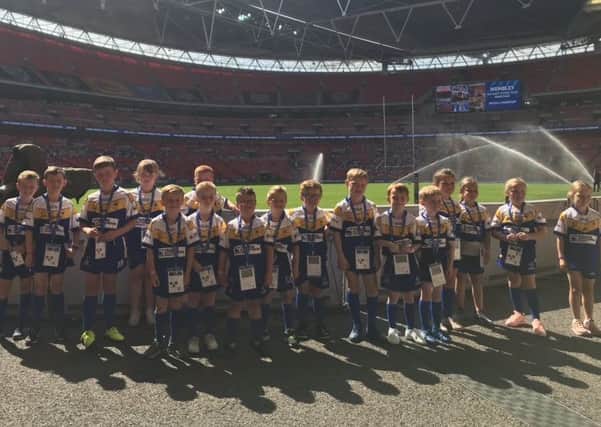 Batley Boys youngsters were mascots to the Warrington Wolves team at last Saturdays Chalenge Cup Final.