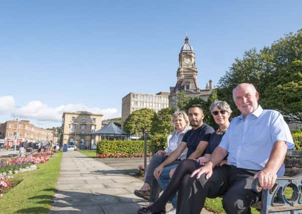 Members of Dewsbury Forward are celebrating news of £1m funding to help improve the town centre.Pictured are Marilyn Shaw, Imran Ahmed,Jackie Ramsay and Eric Firth.  Picture Scott Merrylees