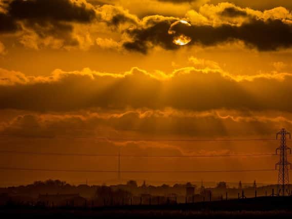 A magnificent sunset over Castleford, looking towards Emley Moor transmitting station, near Huddersfield. Picture: James Hardisty.