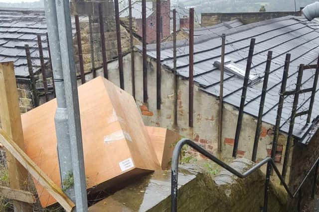 Packaging dumped in Birstalls high street car park with delivery information