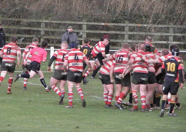 Mikey Hayward (top centre) capitalises from a break to score in the corner during Cleckheatons derby victory at Bradford & Bingley in North One East last Saturday. Picture: Gerald Christian.