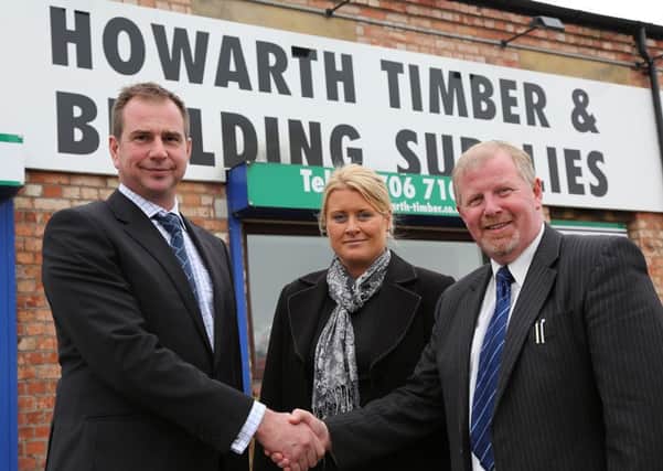 NEW DEAL Antony and Sam Green of Decision2day, left, and Neale Brewster of Howarth Timber.