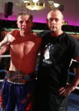 Gary Sykes with trainer Julian McGowan following his win over Kevin Hooper.