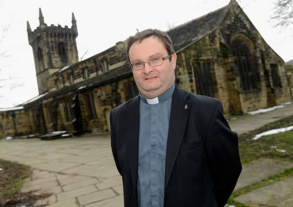 FOND FAREWELL Rev Andrew Johnson is leaving Batley Parish Church after 10 years.