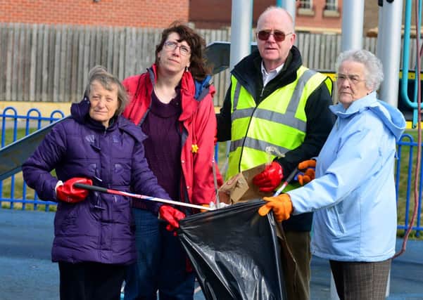 Members of Ravensthorpe Residents Action Group with their bin bags. They will be tidying in the first of a series of litter picks across the estate. Pictured are Anne Blackburn, Karen Mayfield, Bruce Bird and Betty Lyons. (D544A316)