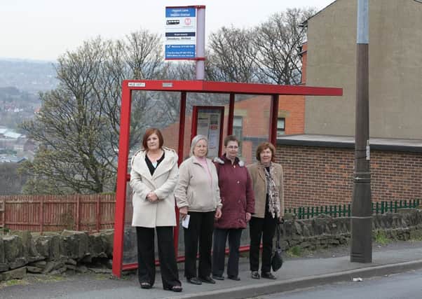 ANGRY RESIDENTS Coun Vivien Lees-Hamilton with local residents Chris Breare, Anne Heeley and Sylvia Downey who are angry about plans to get rid of a bus shelter in Upper Hopton. (d204b317)