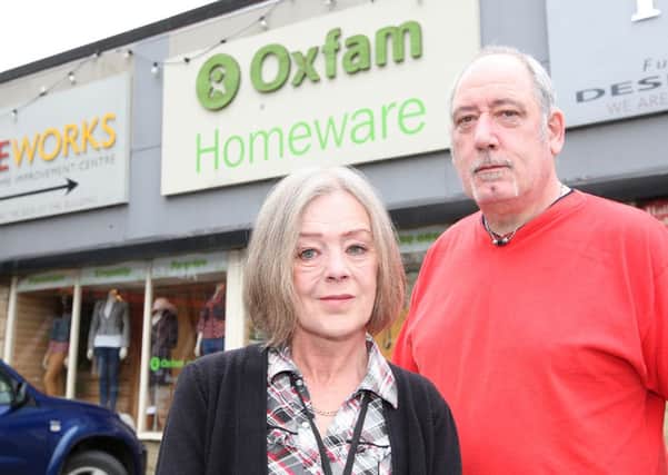 Peter Laird and Anne Dransfield from Oxfam in Mirfield, who were left devastated by a burglary last week.