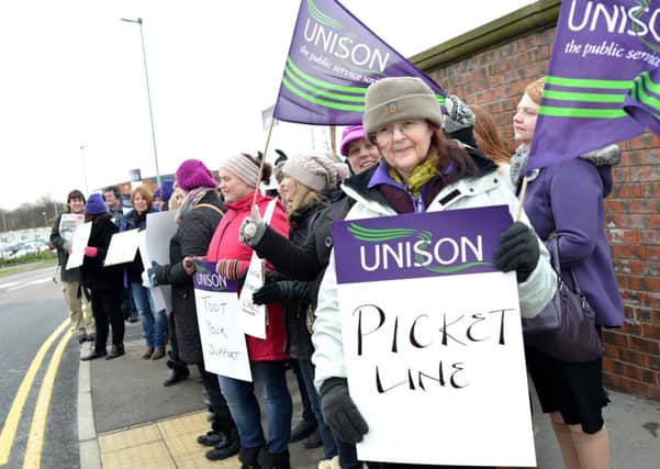 STRIKE Unison members picketing outside Pinderfields Hospital during January's strike action.