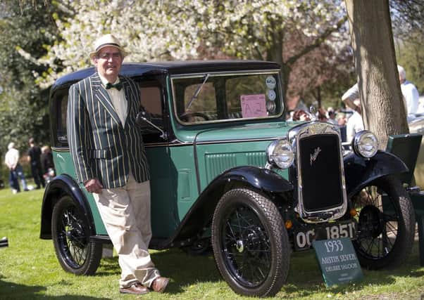 CLASSIC LOOK Mervyn Hoyle proudly shows off his 1933 Austin Seven. (d713p319)