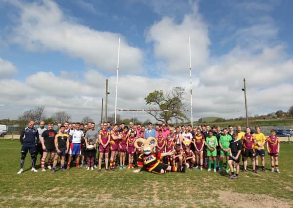 TAG TEAMS Players and supporters who turned out for Dewsbury Moor Amateur Rugby League Club's fundraiser. (d228a319)