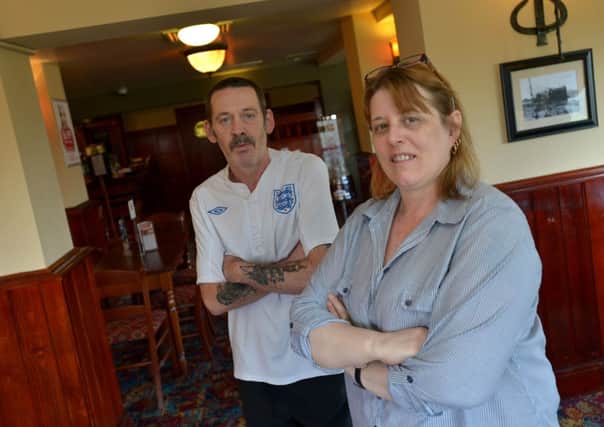 TAKING ACTION Gerry Smyth and Lyn Nicholls have had to hire door staff for their pub, The Thirsty Man.