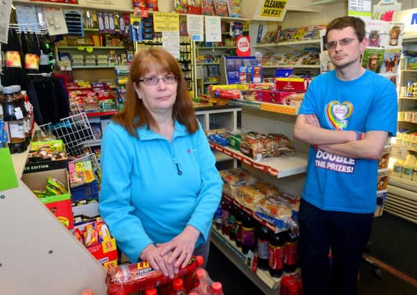 Julie and Chris Bruce from Lower Hopton News. The newsagents was burgled last week which was a huge blow to the business. (D541B320)
