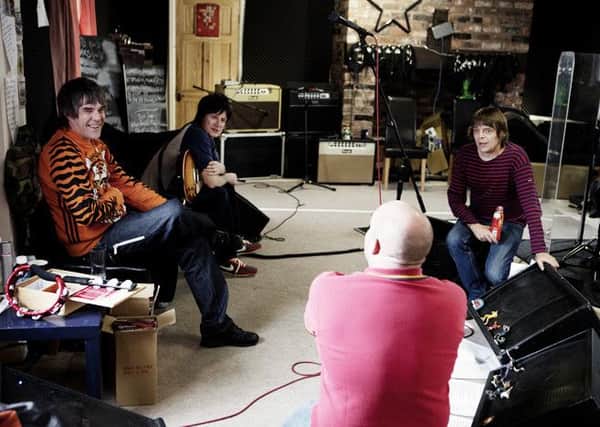 Stone Roses' Ian Brown, John Squire and Mani with documentary director Shane Meadows.