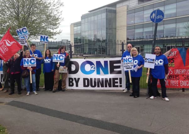 O2 workers demonstrate outside the company's Arlington Business Centre premises.