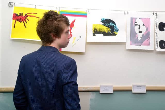 COLOURFUL Tom Young looks at some of the work on display. (D525C323)