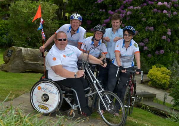 Paul Cartwright with members of the Hollybank Great Yorkshire Cycle Ride team Martin Bolt, Rosie James, Henry Bisson and Suzanne Barton.