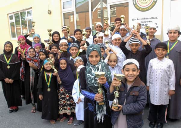 EXAM SUCCESS Pupils at the Mohaddis-E-Azam Mission  Madani Mosque who were rewarded for their hard work.